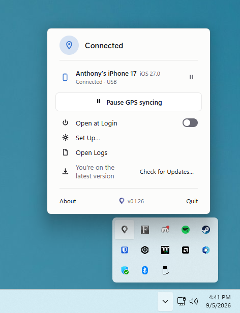 GeoSpoof GPS in the Windows notification area, with its panel open